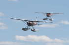 Cessna floatplanes formation flying