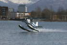 Cessna floatlane taking off