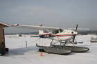 Parking Cessna floatplane in the winter
